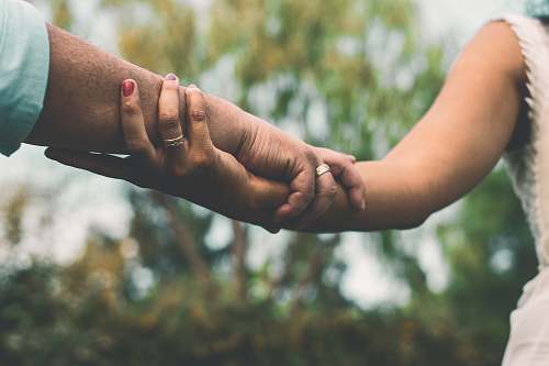 holding hands woman and man holding hands human